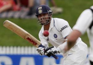 India's Sachin Tendulkar plays a shot on his way to scoring his 42nd test century on day three during the first test cricket match against New Zealand
